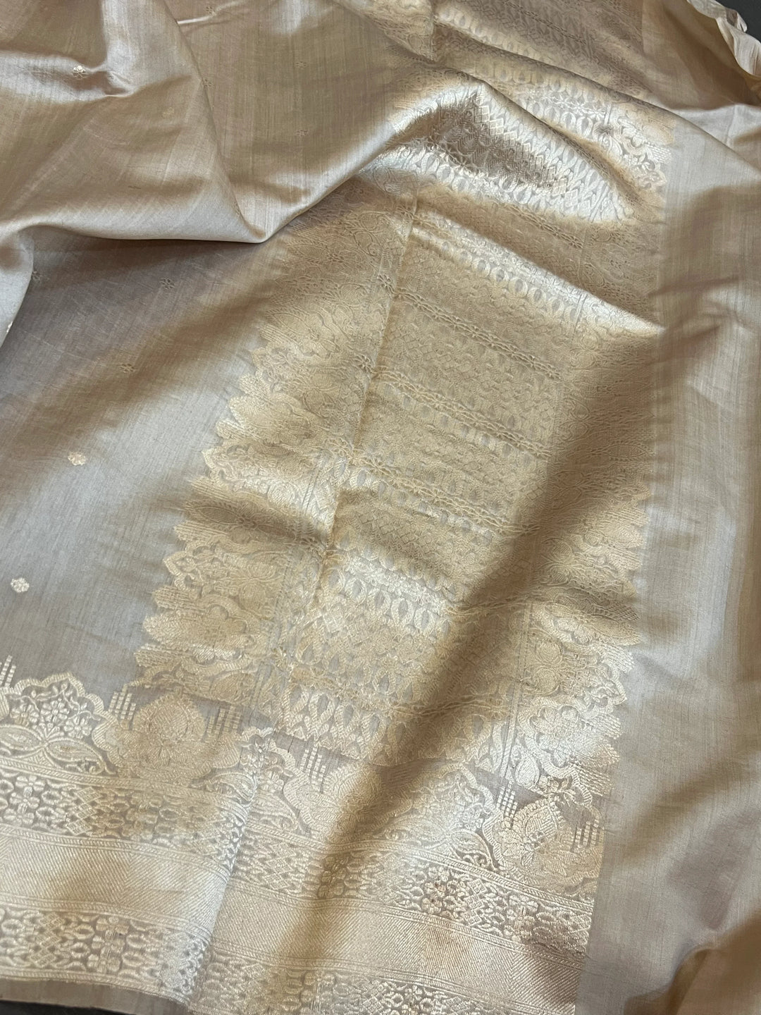 Beige Banarasi saree pallu with traditional golden zari handwoven border