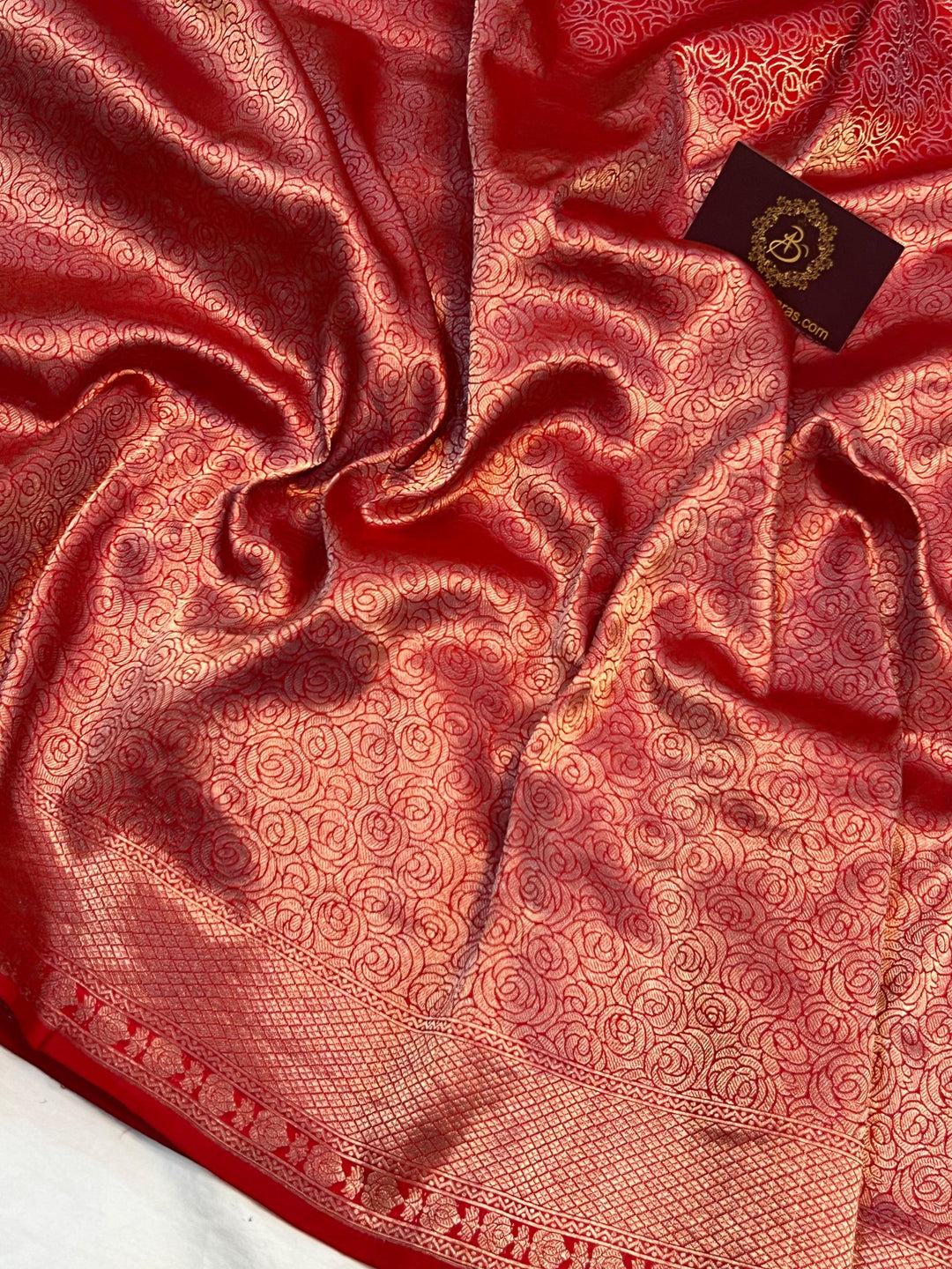 Exquisite floral brocade weaving in lower half of pure Katan silk Banarasi saree