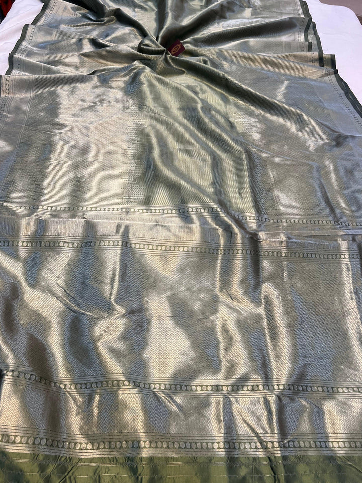 Pure Katan silk handloom Banarasi saree with geometric brocade design, lines in lower and upper portions, and 3D dots in middle