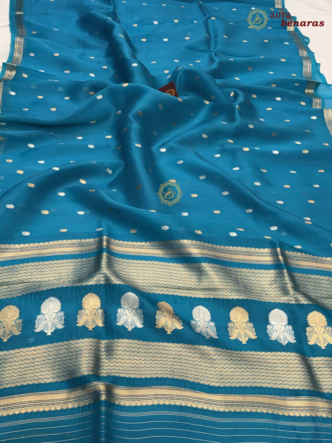 Pure Rama Blue Kora Silk Banarasi Saree with Kadhwa Flower Butas