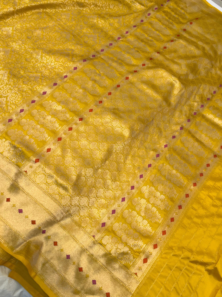 Rich pallu of pure Katan silk handloom Banarasi saree highlighting the golden zari geometric design
