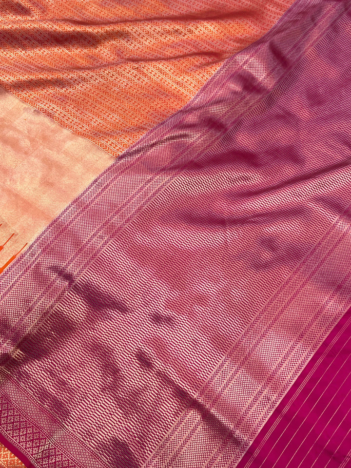 Elegant pallu of pure Katan silk Banarasi saree showcasing the temple border and designer lines