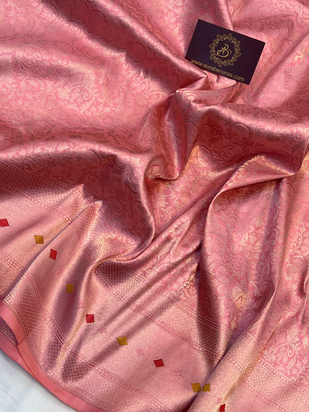 Golden zari geometric brocade work on pure Katan silk Banarasi saree with Meenakari border