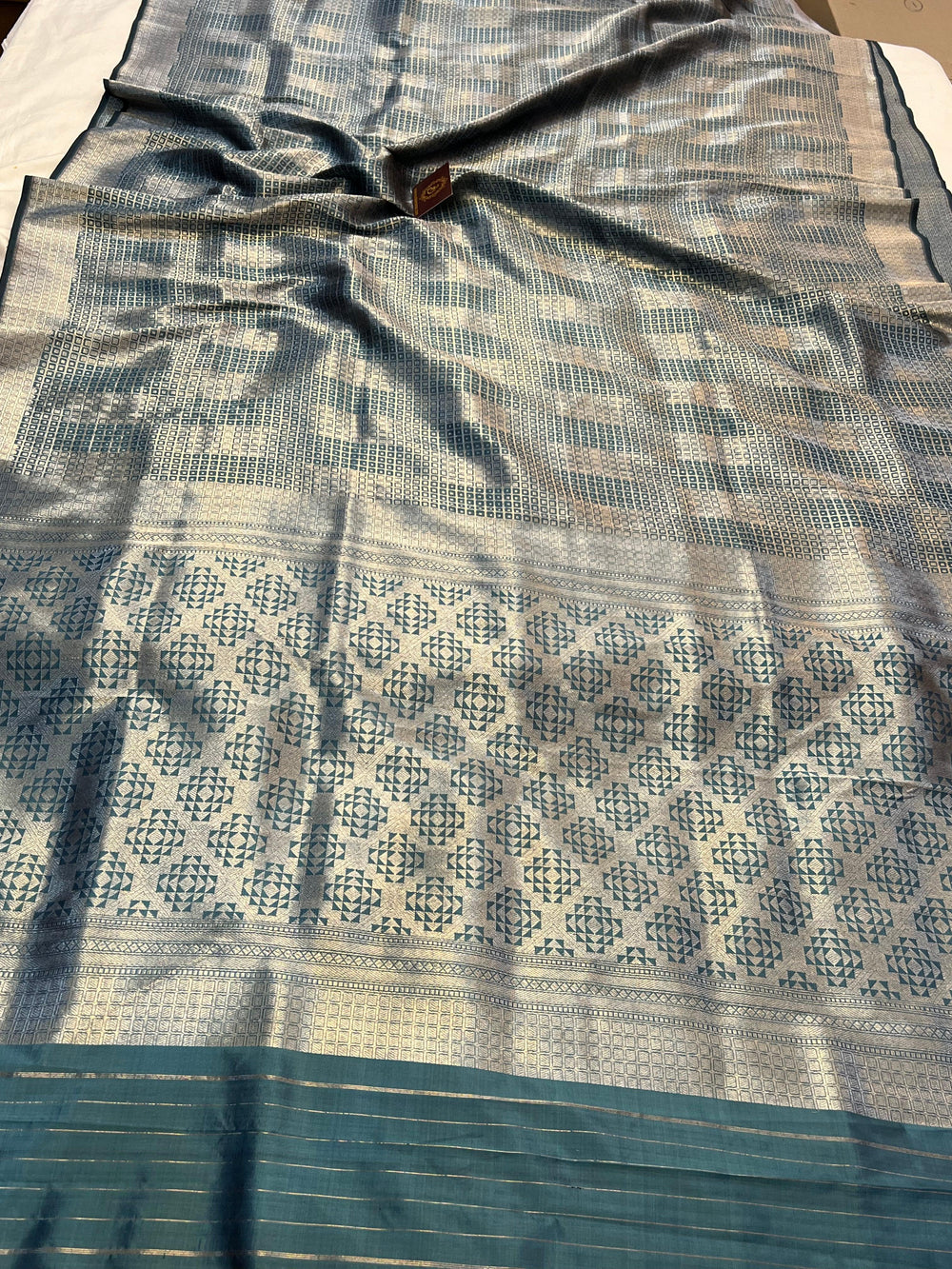 Pure Katan silk handloom Banarasi saree with silver zari geometric brocade and Banarasi border