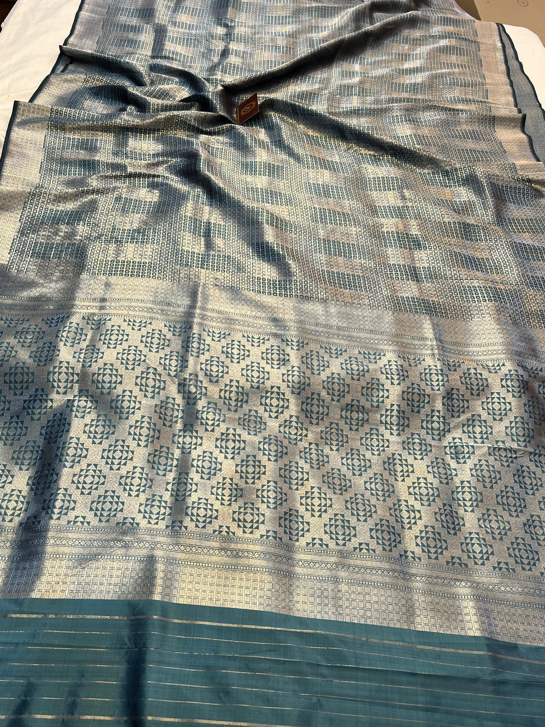 Pure Katan silk handloom Banarasi saree with silver zari geometric brocade and Banarasi border