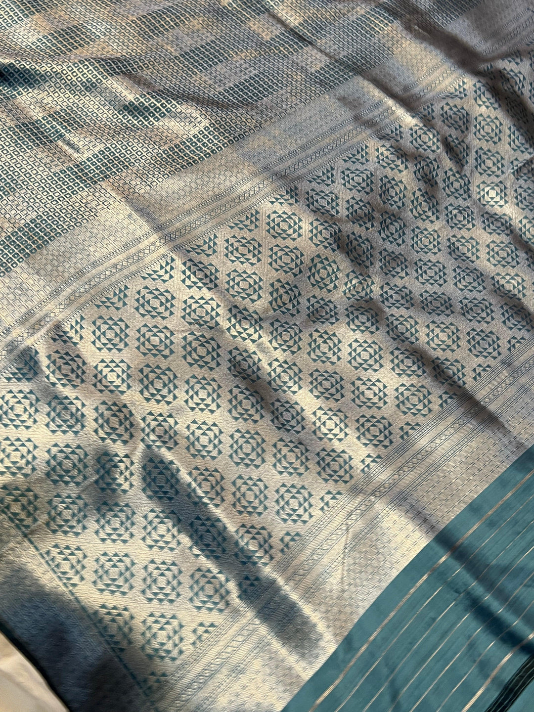Elegant pallu of pure Katan silk Banarasi saree highlighting silver zari brocade