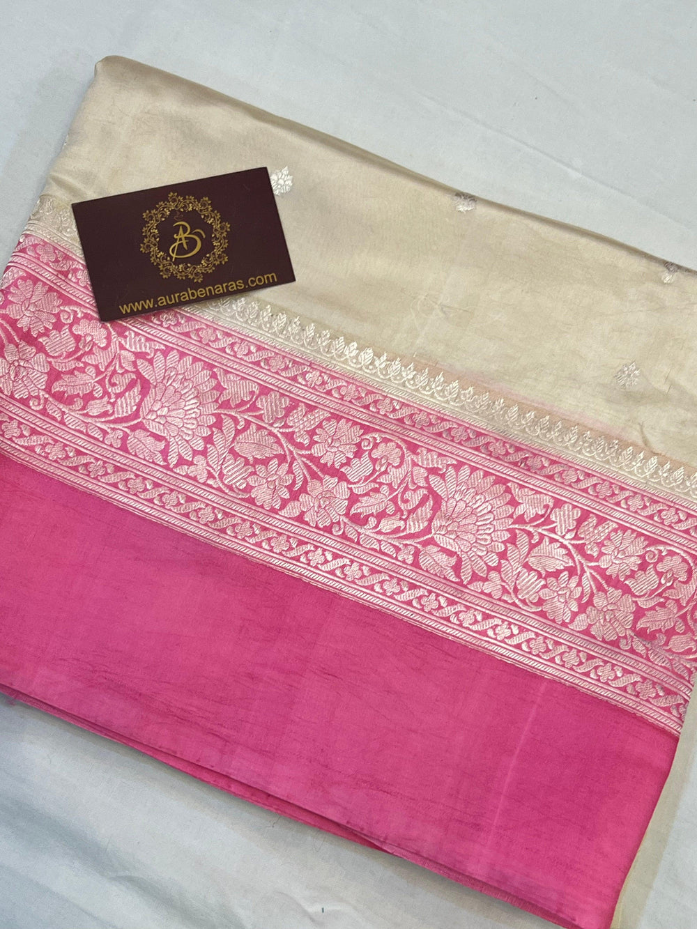 Intricate silver zari Kadhwa buta and buti on Banarasi pure silk saree