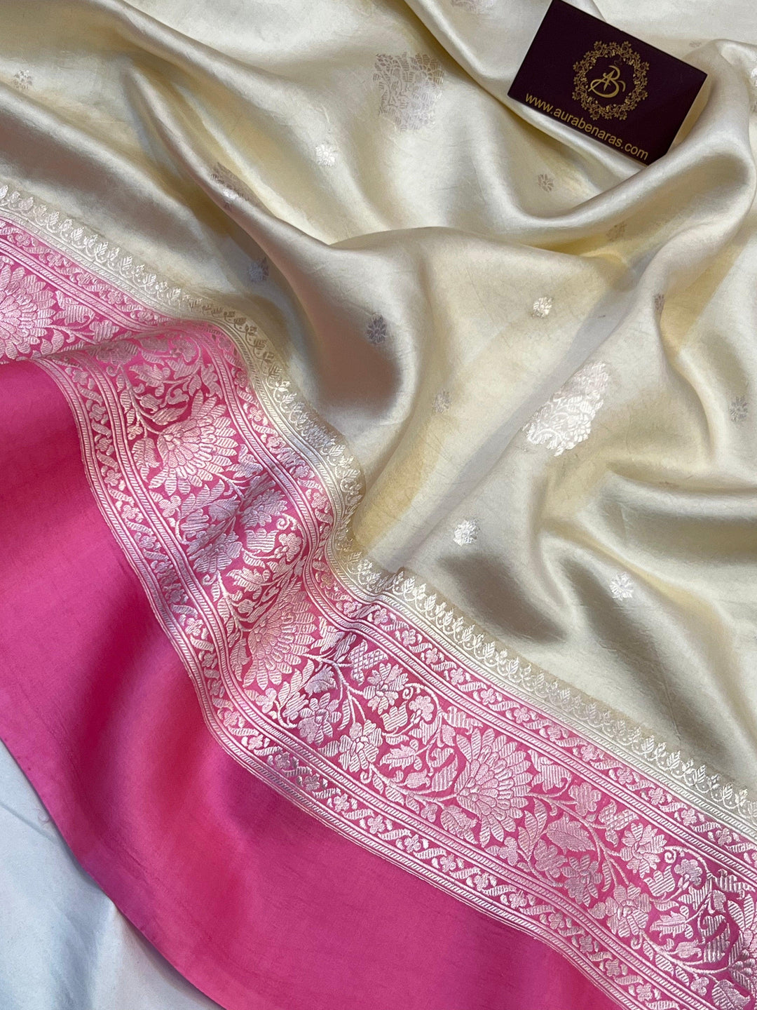 Intricate silver zari Kadhwa buta and buti on Banarasi pure silk saree