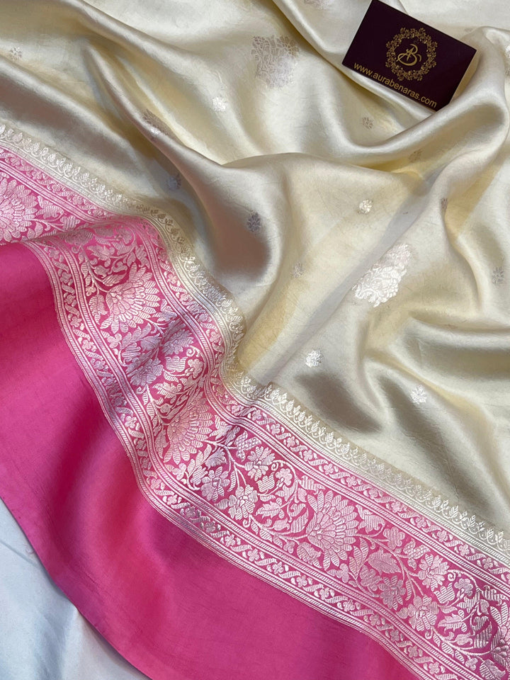 Intricate silver zari Kadhwa buta and buti on Banarasi pure silk saree