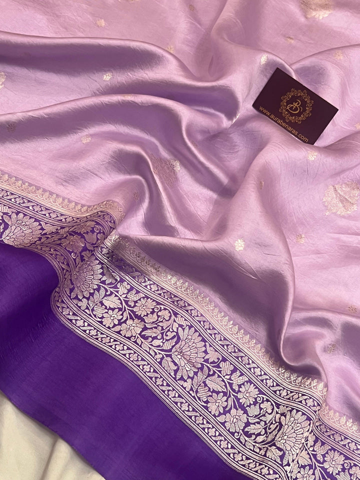 Intricate silver zari Kadhwa buta and buti on Banarasi pure silk saree