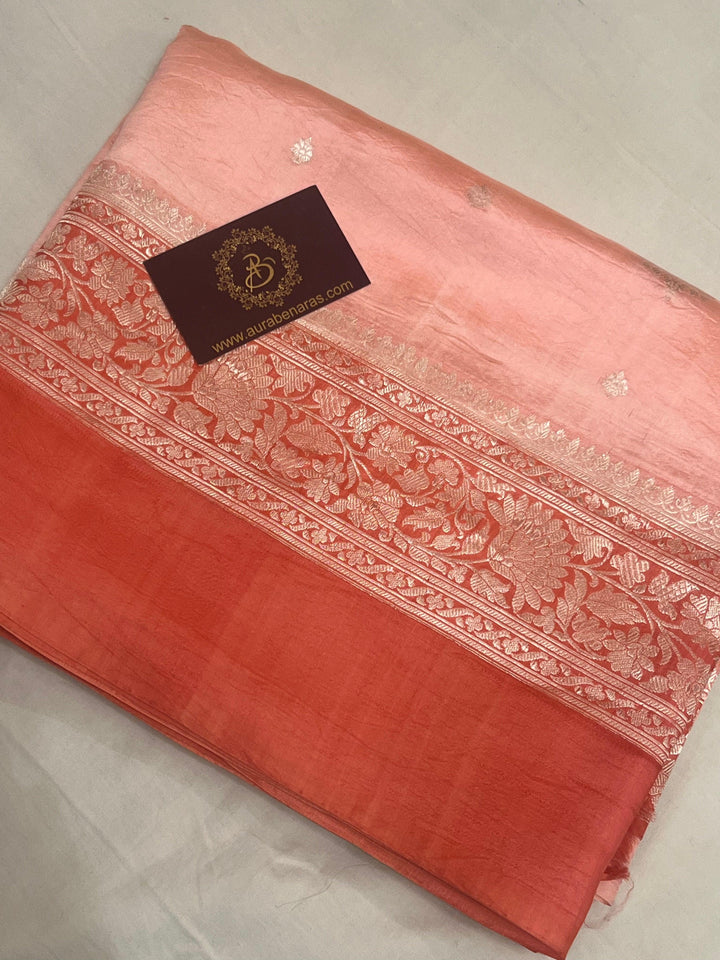 Intricate silver zari Kadhwa buta and buti on Banarasi pure silk saree