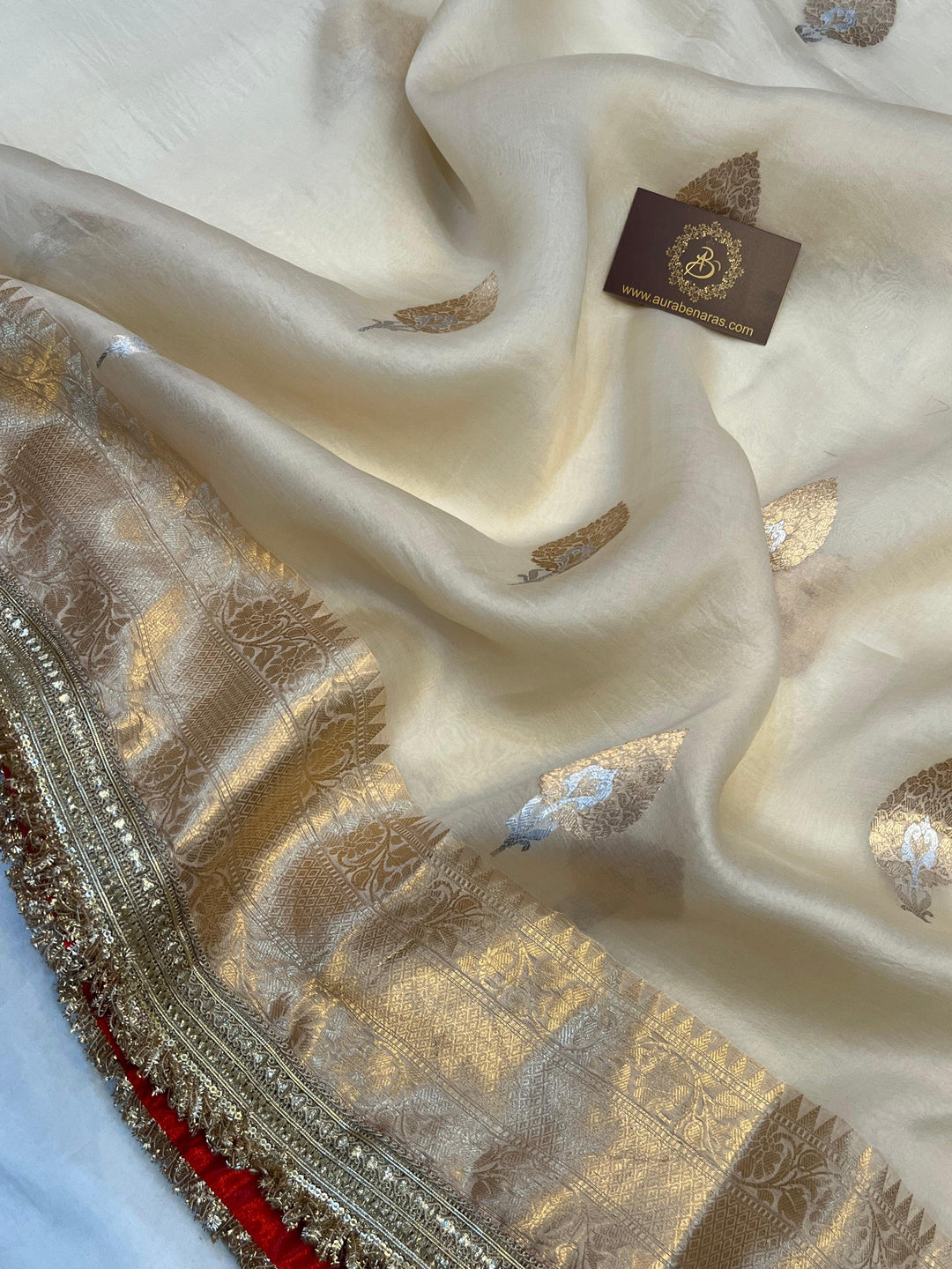 Zoomed-in image showing gold and silver Sona Rupa zari motifs in handwoven Kadhwa technique