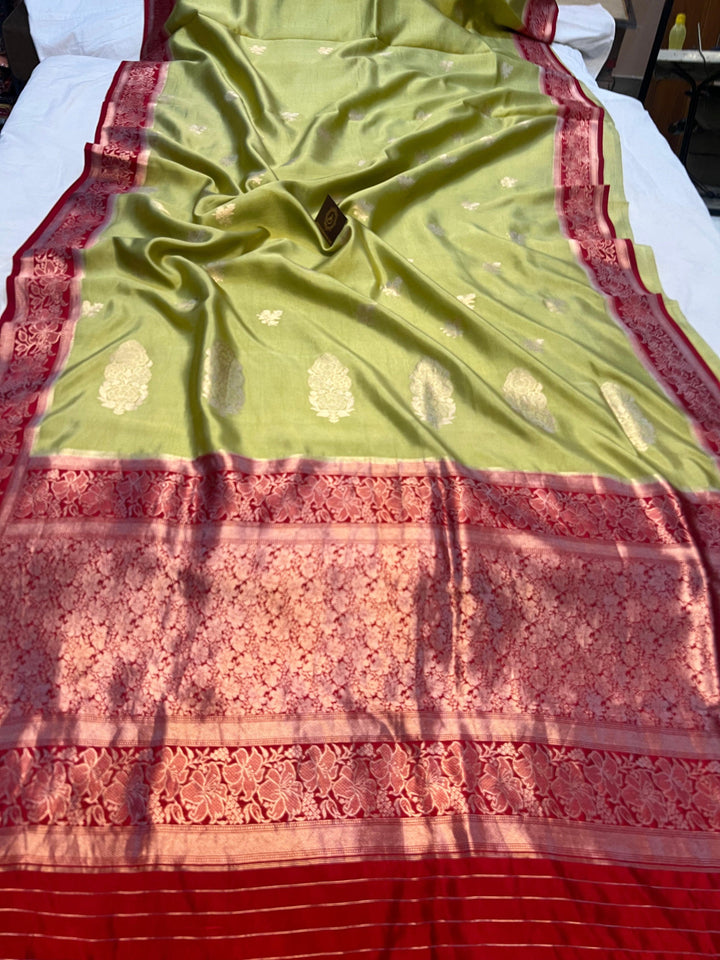 Pure silk Banarasi handloom saree with Kadhwa floral motifs and golden zari border