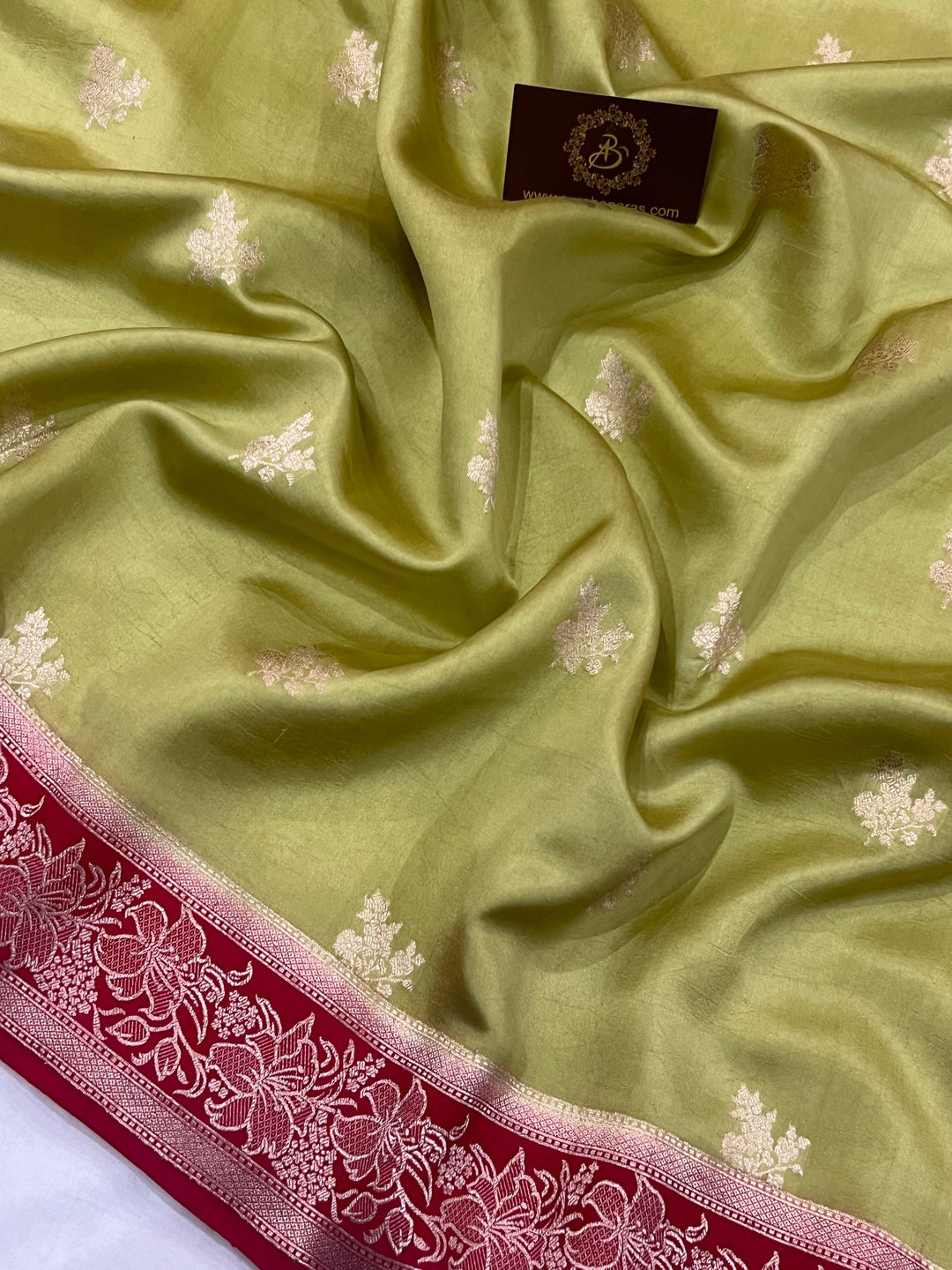 Handwoven Kadhwa floral motifs on luxurious Banarasi silk fabric