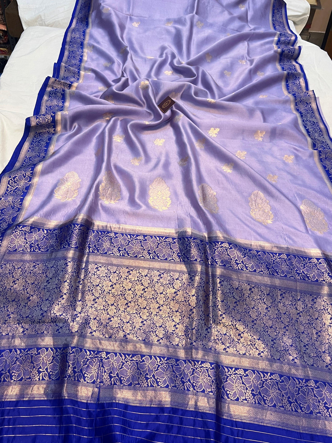 Pure silk Banarasi handloom saree with Kadhwa floral motifs and golden zari border