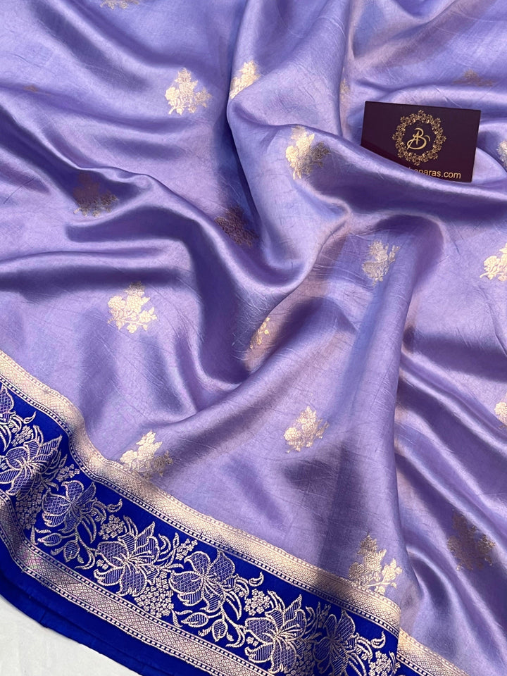 Handwoven Kadhwa floral motifs on luxurious Banarasi silk fabric
