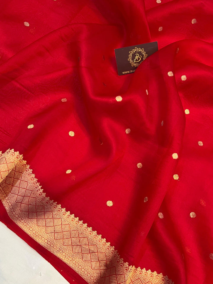 Small golden zari butis on handwoven Kora silk fabric using traditional Kadhwa technique