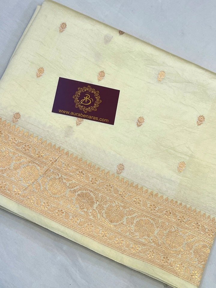 Pale Yellow Pure silk handloom Banarasi saree with Kadhwa butis, golden zari border, and striped blouse piece in rich traditional design
