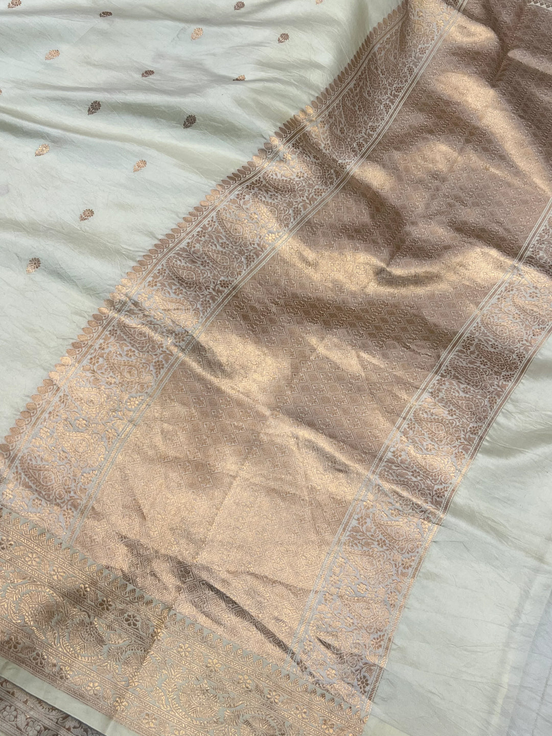 Pale Yellow Pure silk handloom Banarasi saree with Kadhwa butis, golden zari border, and striped blouse piece in rich traditional design