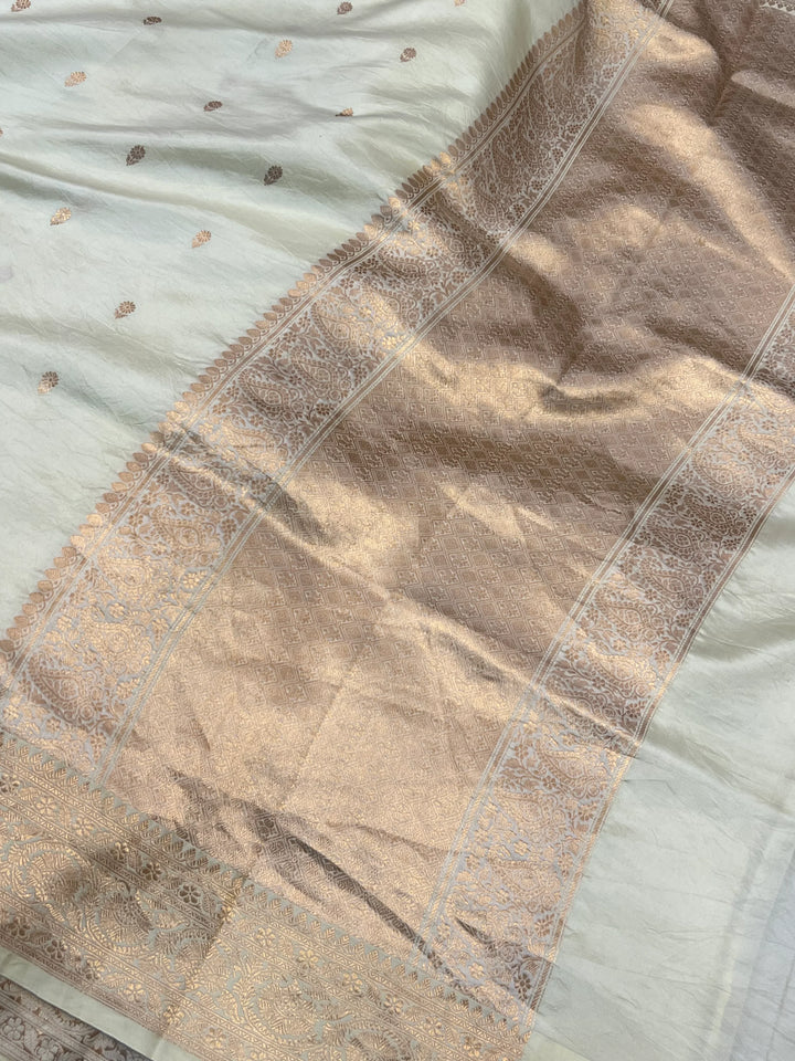 Pale Yellow Pure silk handloom Banarasi saree with Kadhwa butis, golden zari border, and striped blouse piece in rich traditional design