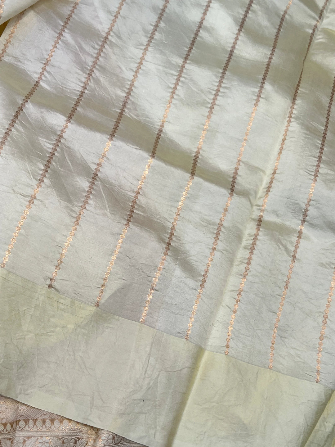 Pale Yellow Pure silk handloom Banarasi saree with Kadhwa butis, golden zari border, and striped blouse piece in rich traditional design