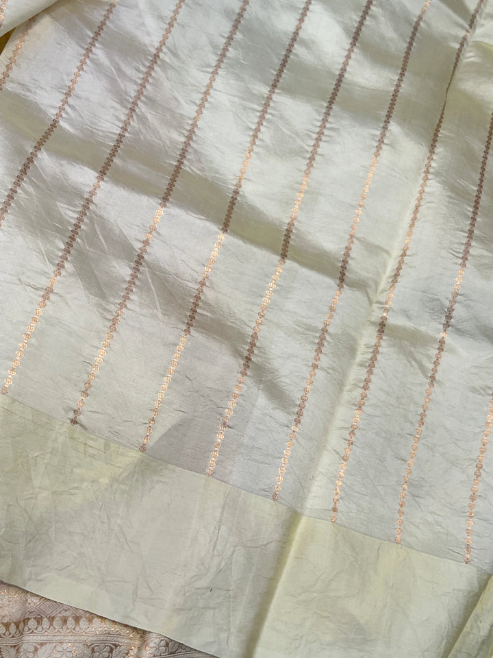 Pale Yellow Pure silk handloom Banarasi saree with Kadhwa butis, golden zari border, and striped blouse piece in rich traditional design