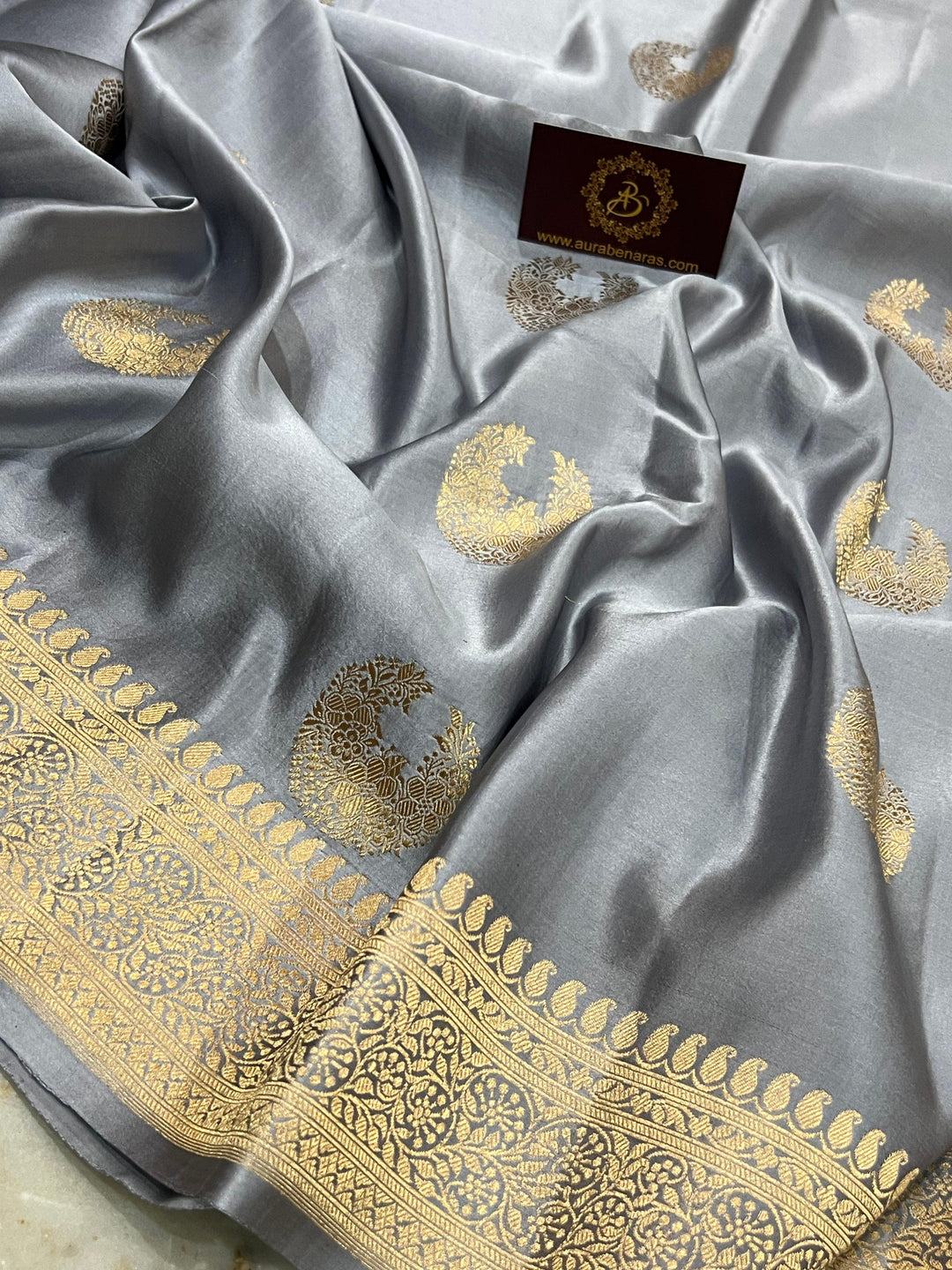 Intricate Kadhwa motifs handwoven on pure silk Mashru Banarasi saree
