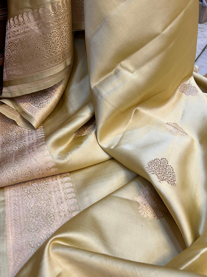 Handwoven pure Banarasi Mashru silk saree with Kadhwa motifs and golden zari border