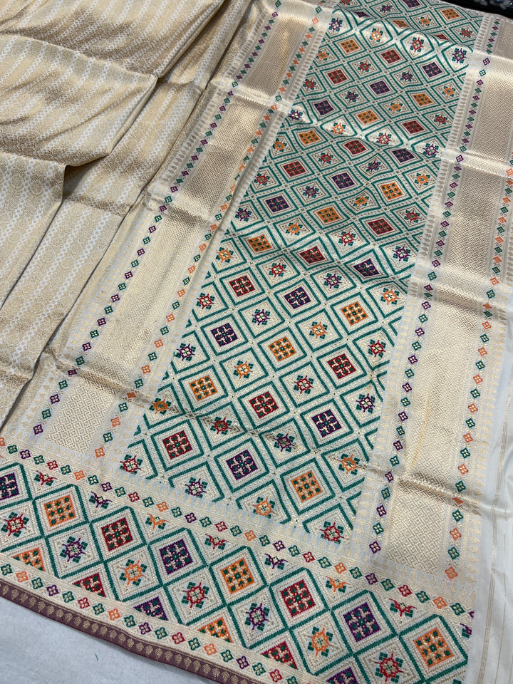 Off White Katan Silk Saree with Kadhwa Meenakari Buti & Border
