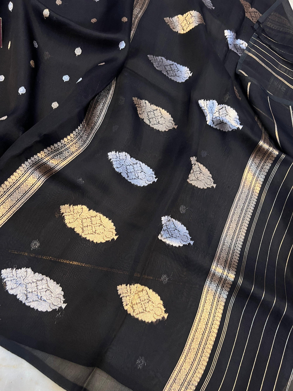 Elegant pallu with zari butas on Kora silk Banarasi saree