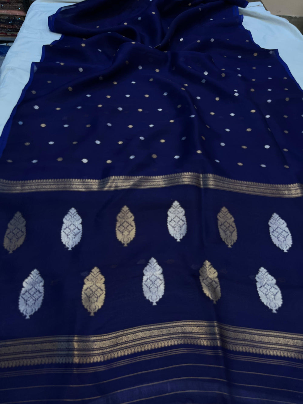 Pure Banarasi handloom Kora silk saree with allover Kadhwa butis in gold and silver zari