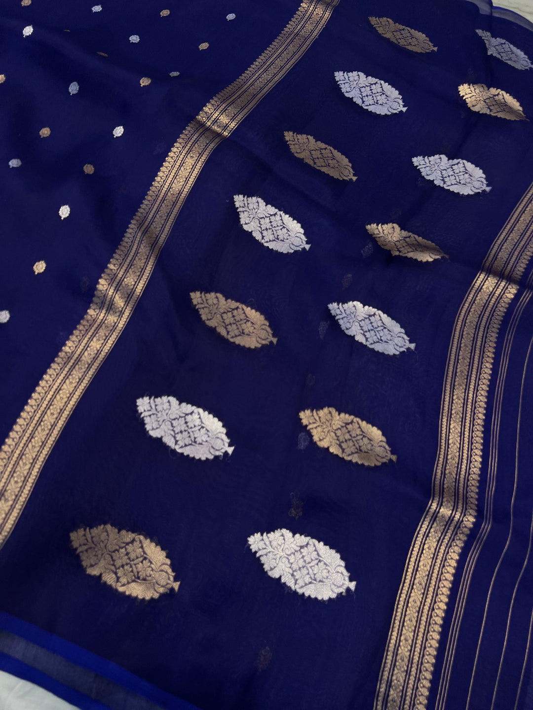Elegant pallu with zari butas on Kora silk Banarasi saree


