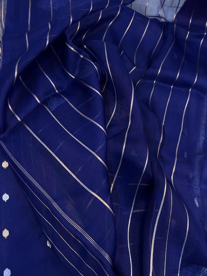 Striped blouse piece included with Banarasi Kora silk saree