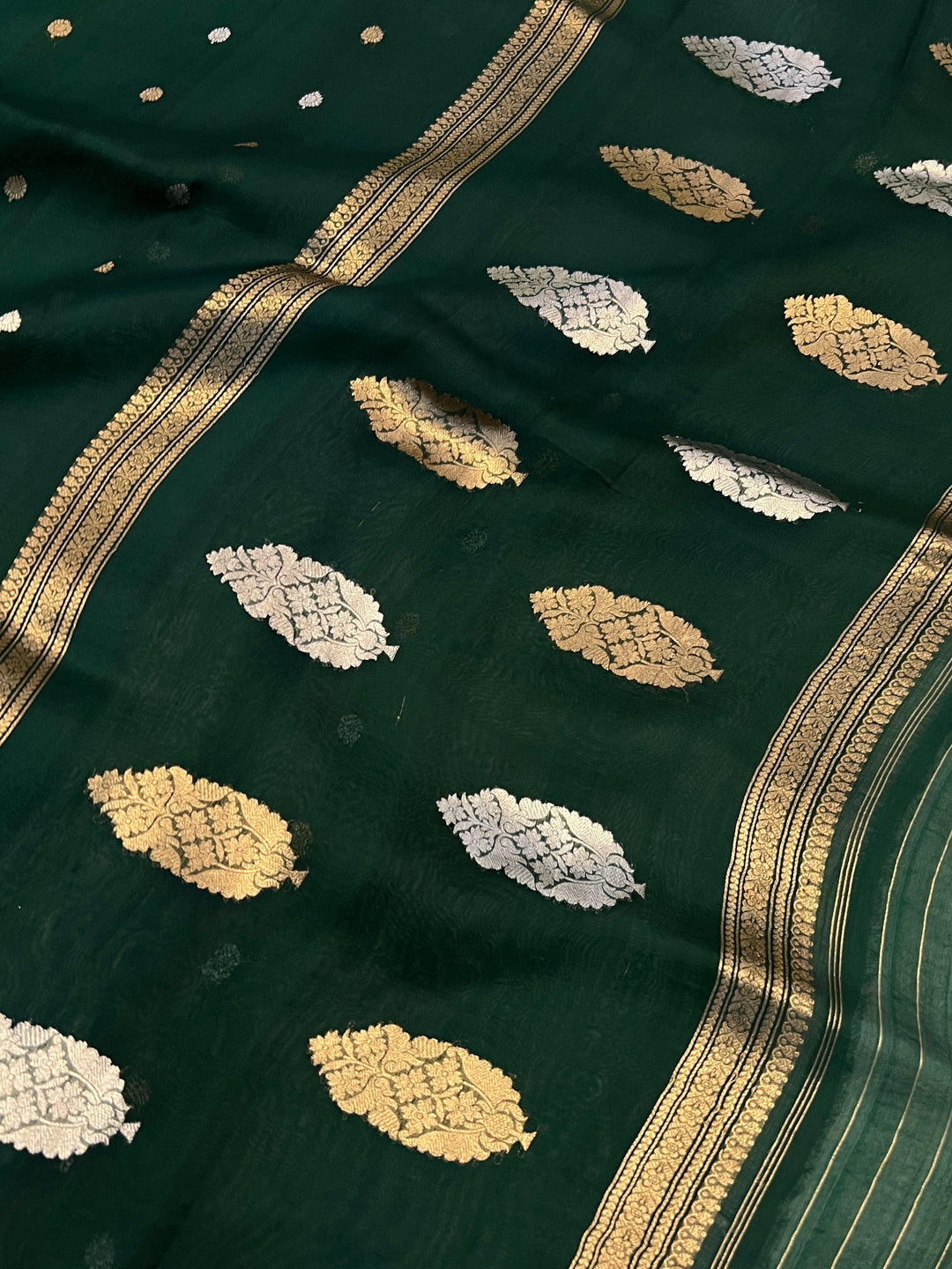 Elegant pallu with zari butas on Kora silk Banarasi saree