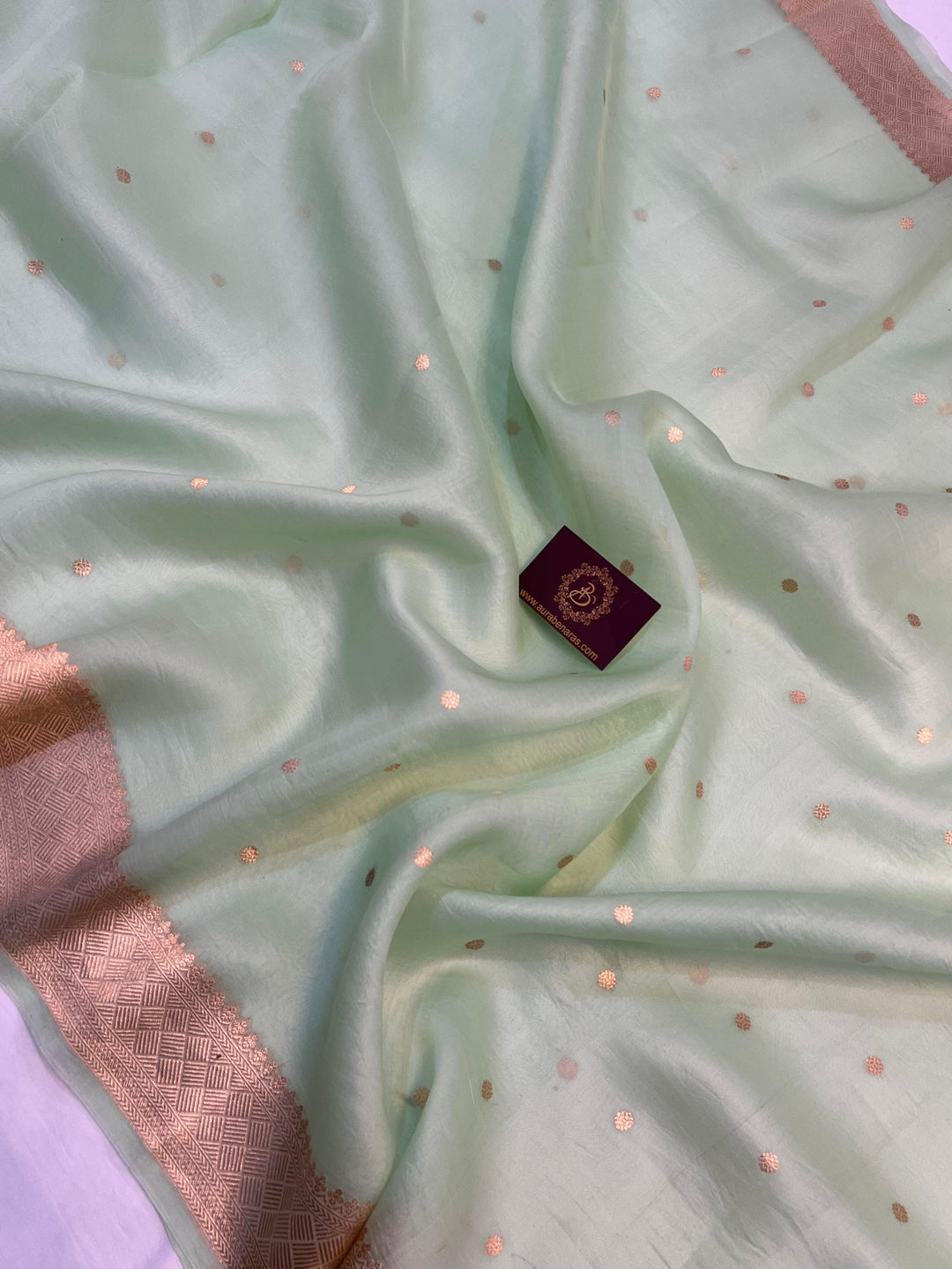 Sleek Banarasi border in golden zari on sheer organza silk fabric