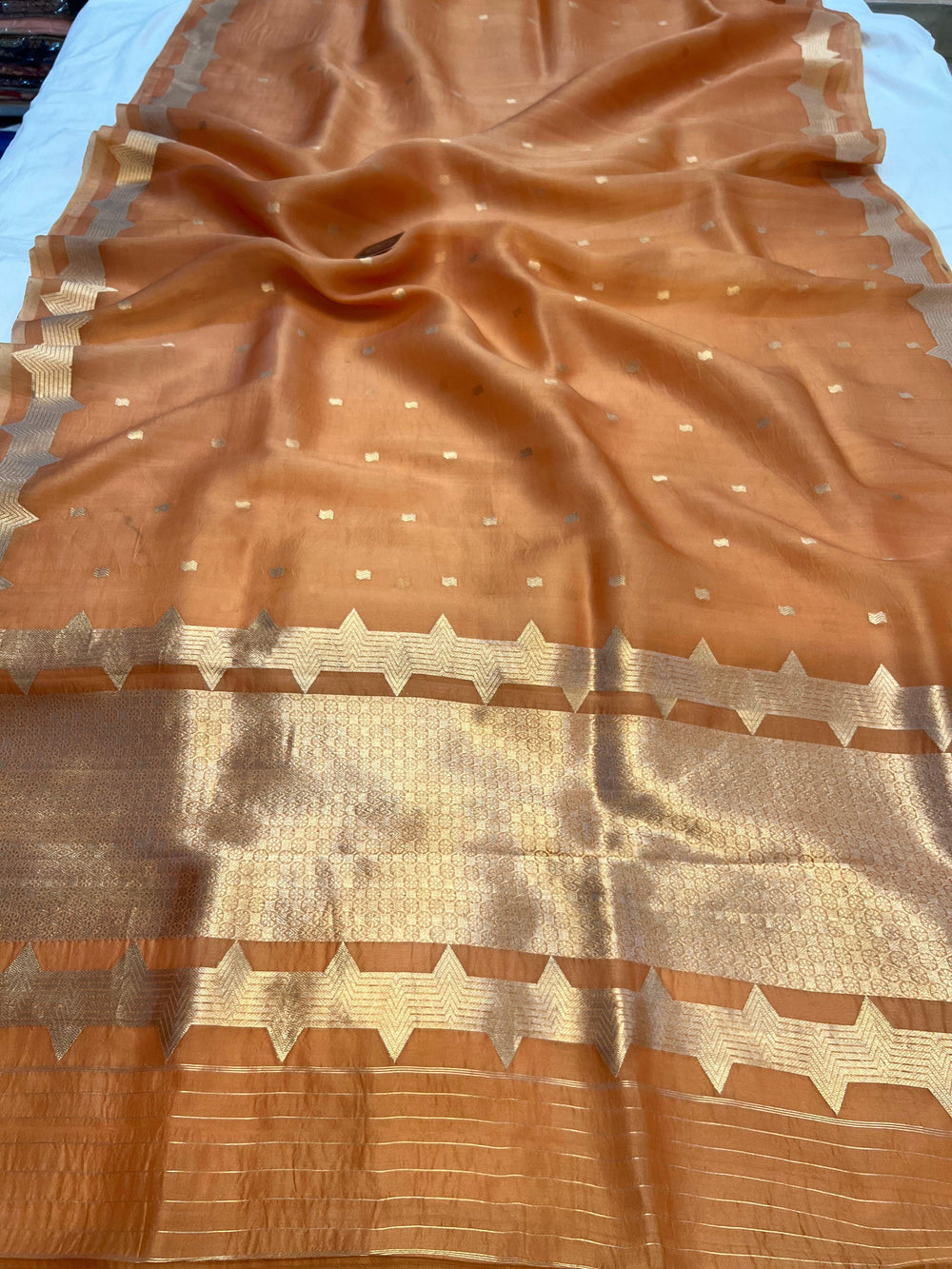 Pure Kora Silk Handloom Banarasi Saree draped with golden zari butis and sleek Banarasi border, woven using Kadhwa technique