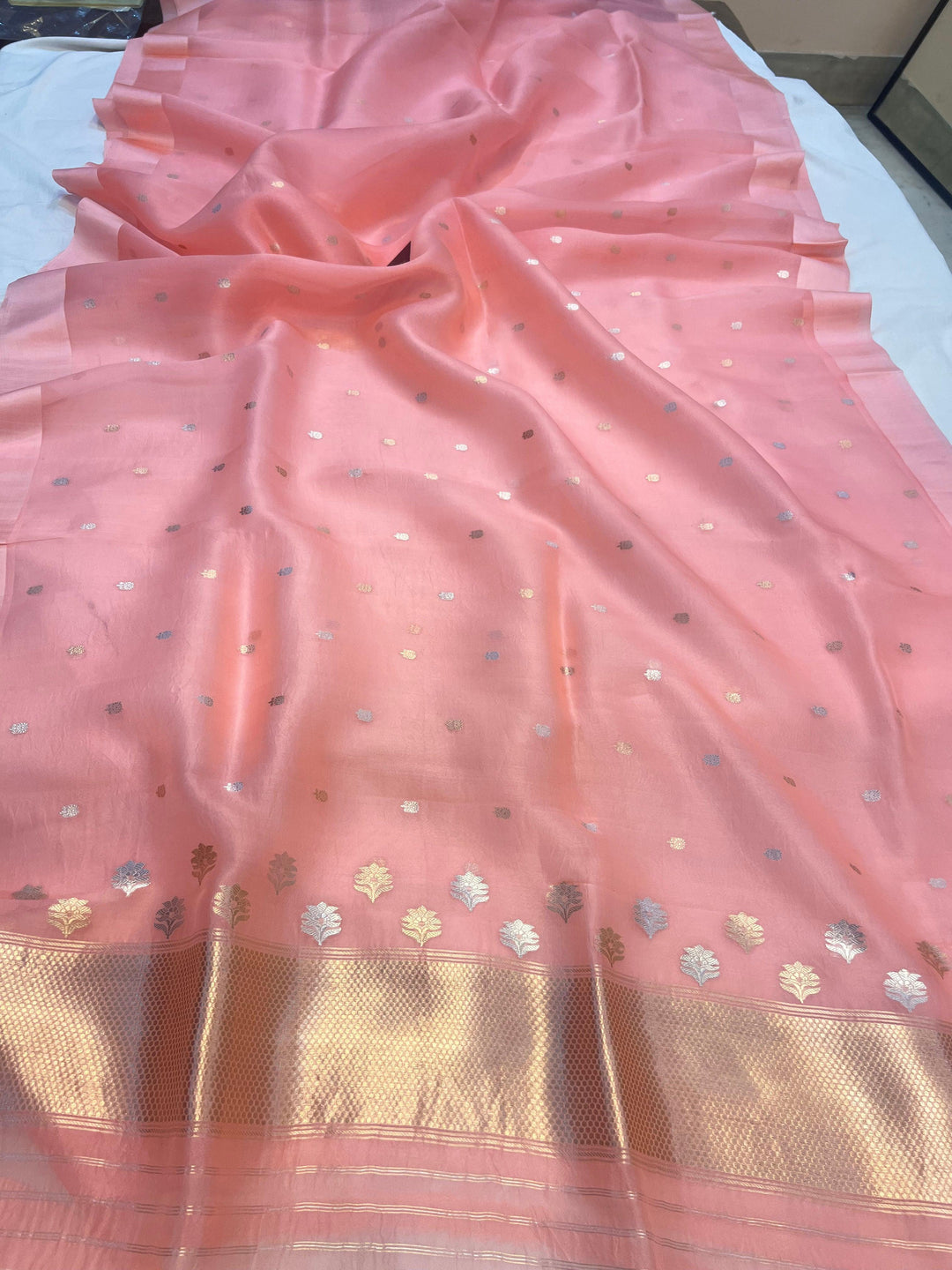 Pure Kora Silk Handloom Banarasi Saree draped with Sona Rupa butis and contrasting Mashru silk border