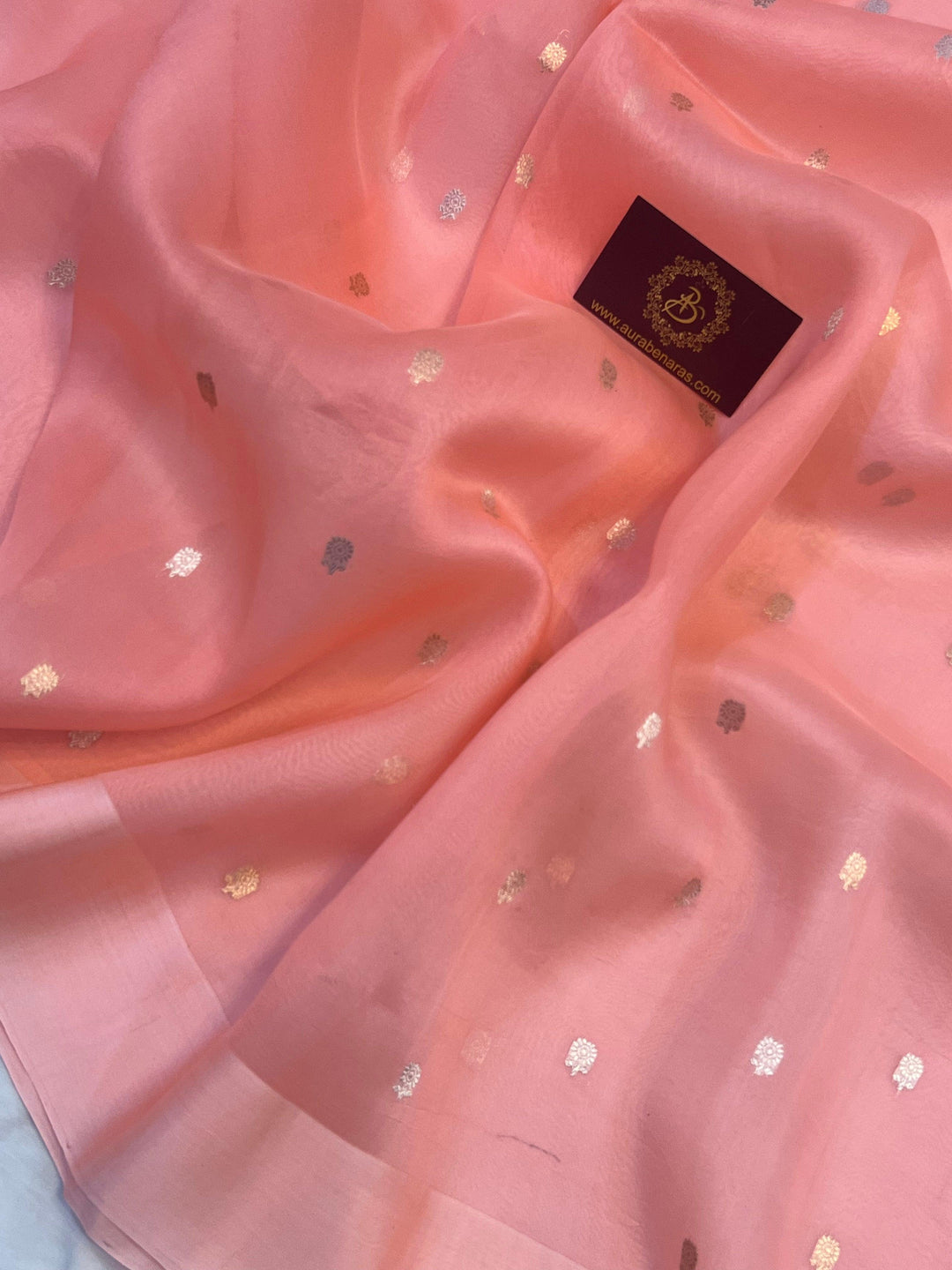 Gold and silver Sona Rupa butis woven on translucent Kora silk using Kadhwa technique