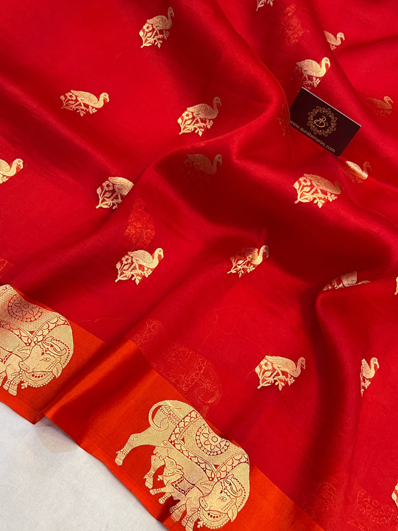 Reddish Orange Kora Silk Banarasi Saree | Cow Motif Border