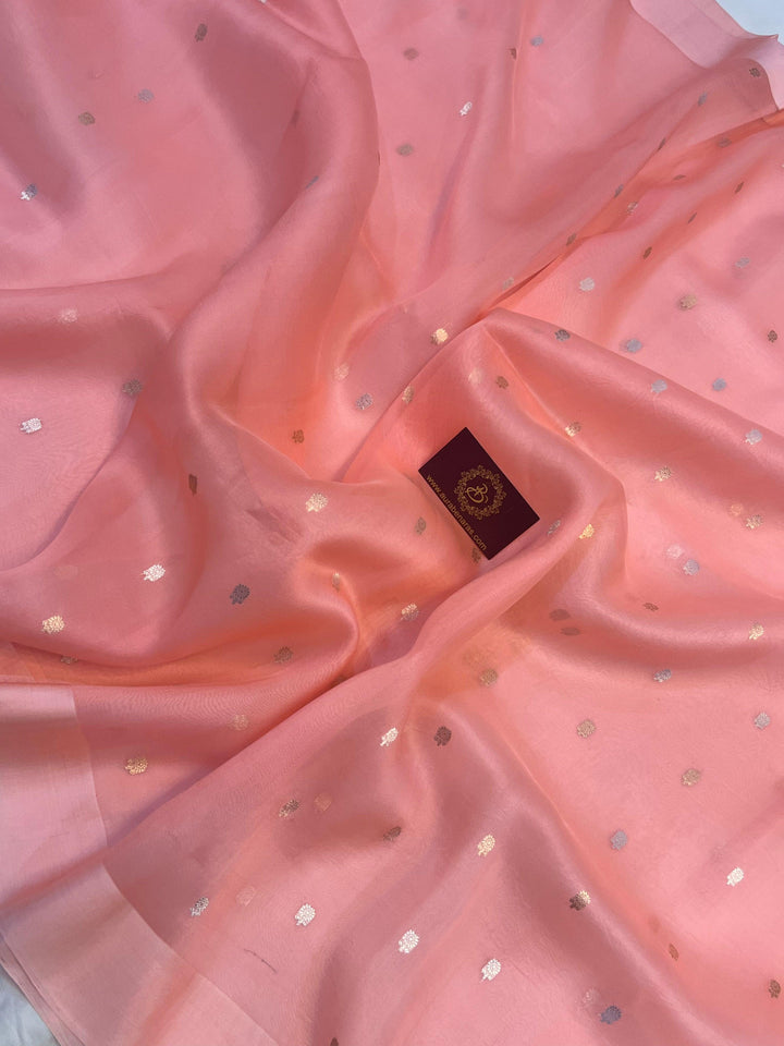 Rich Mashru silk Banarasi border with golden zari detailing on handloom Kora silk saree