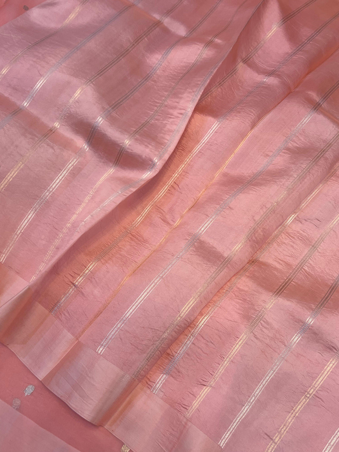 Striped silk blouse piece included with the Kora silk Banarasi saree for coordinated styling