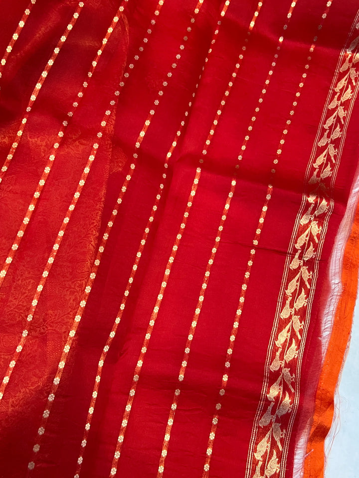Reddish Orange Kora Silk Banarasi Saree | Cow Motif Border