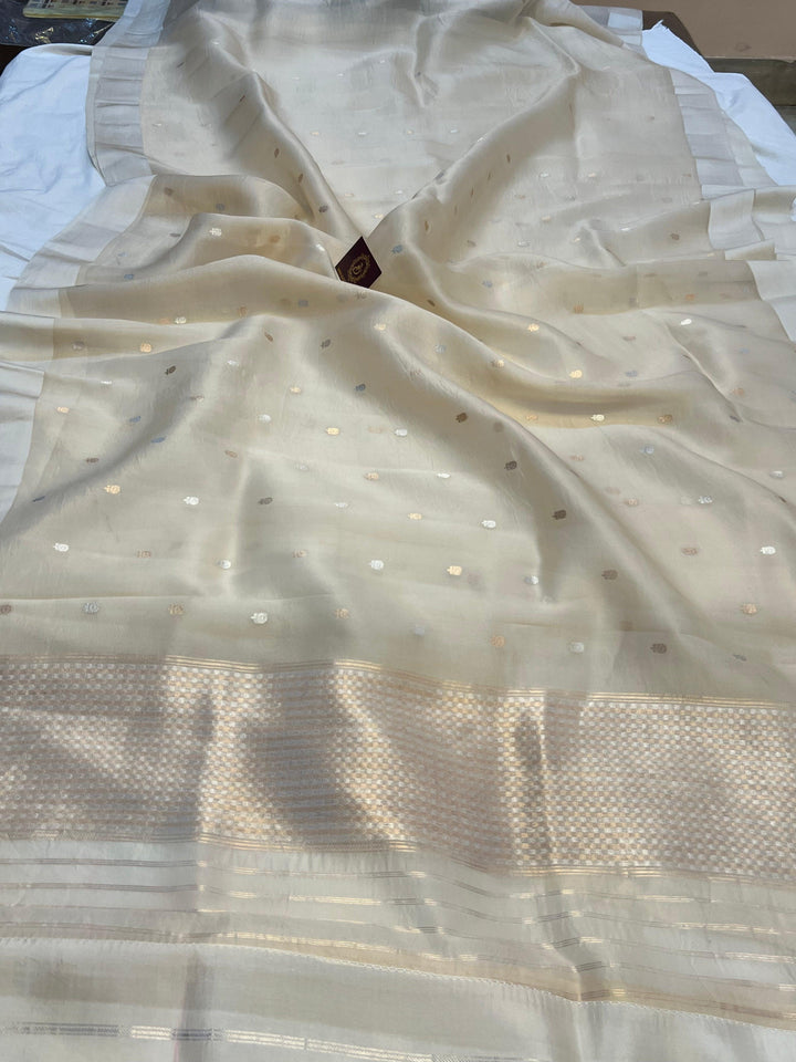 Pure Kora Silk Handloom Banarasi Saree draped with Sona Rupa butis and contrasting Mashru silk border