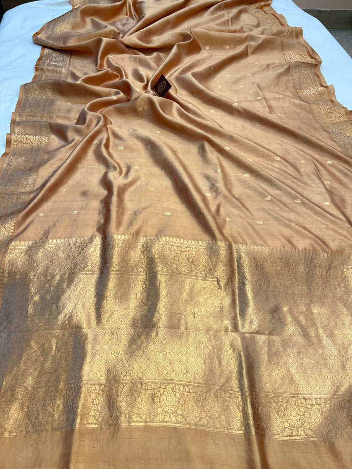 Golden Pure silk handloom Banarasi saree with Kadhwa butis, golden zari border, and striped blouse piece in rich traditional design