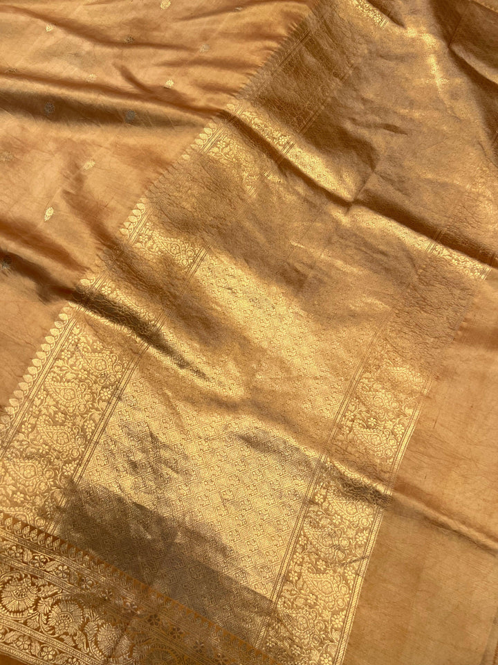 Golden Pure silk handloom Banarasi saree with Kadhwa butis, golden zari border, and striped blouse piece in rich traditional design