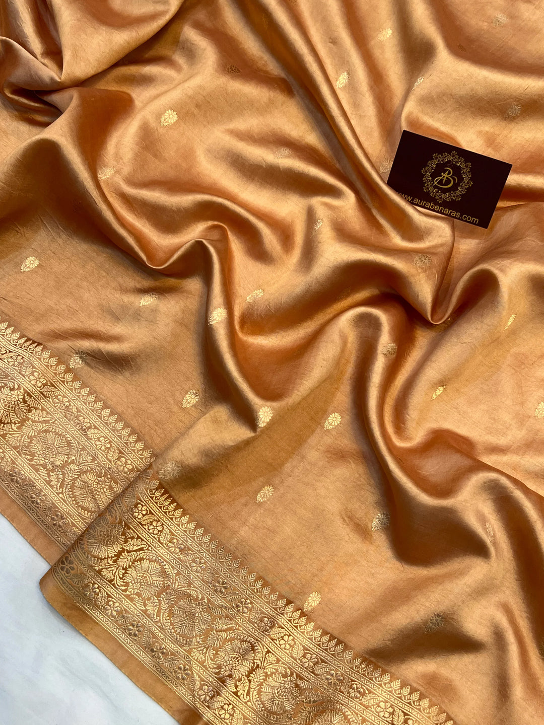 Golden Pure silk handloom Banarasi saree with Kadhwa butis, golden zari border, and striped blouse piece in rich traditional design