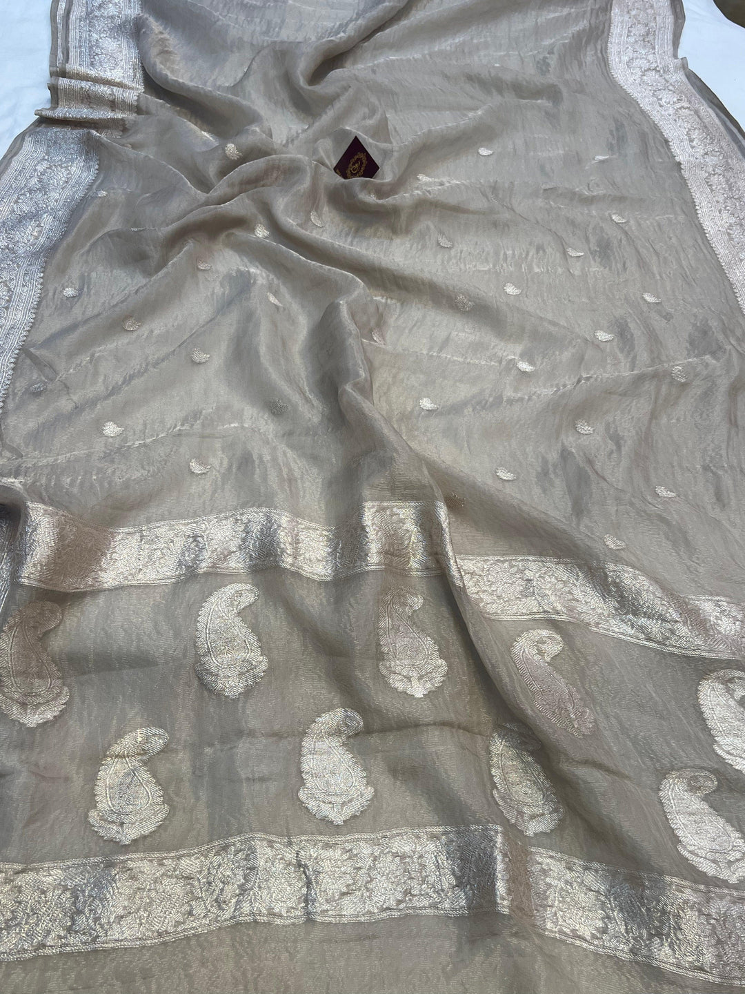 Pure Banarasi crush tissue silk saree with Kadhwa butis and silver zari border


