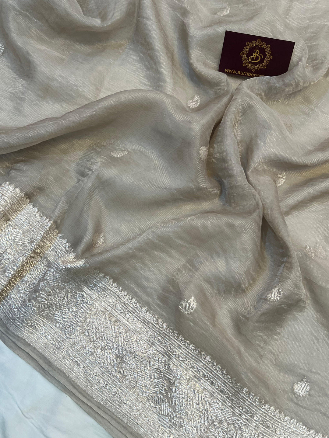 Pure Banarasi crush tissue silk saree with Kadhwa butis and silver zari border