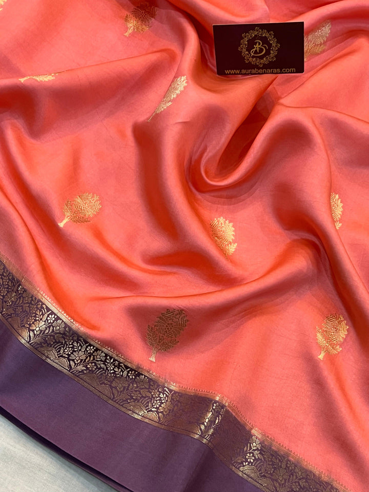 Intricate golden zari Kadhwa butas on pure silk Banarasi saree