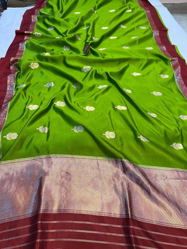 Pure silk handloom Banarasi saree with golden zari Kadhwa butas and contrast Mashru silk borders